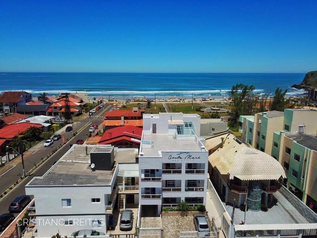 Residencial Costa Mare Apartment Torres Bagian luar foto